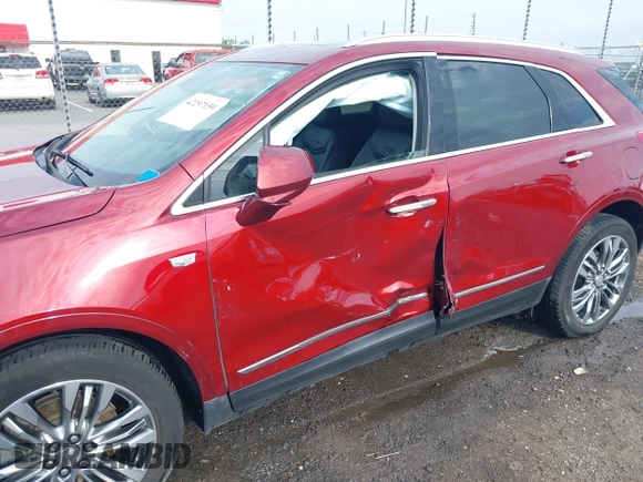 2018 Cadillac XT5 Premium Luxury FWD z VIN 1GYKNERS2JZ242842, wystawiony jako IAAI lot #42297159 z przebiegiem 72 008 mil mil oraz . Historia ofert i sprzedaży dostępna na DreamBid. Obrazek 6.