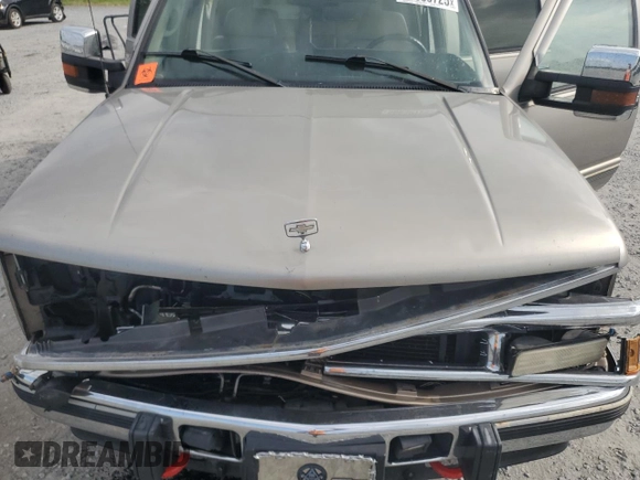 2000 Chevrolet Tahoe Z71 with VIN 1GNEK13R7YR189177, listed as a Copart auction lot 56830725 with 308,270 mi miles and Salvage title. Bid and sale history available at DreamBid. Image 12.