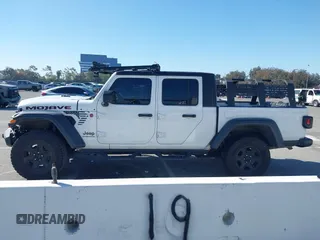 2022 Jeep Gladiator Mojave z VIN 1C6JJTEG0NL103523, wystawiony jako IAAI lot #41842011 z przebiegiem 36 160 mil mil oraz . Historia ofert i sprzedaży dostępna na DreamBid. Obrazek 15.