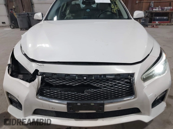 2015 Infiniti Q50 z VIN JN1BV7ARXFM409367, wystawiony jako IAAI lot #41912056 z przebiegiem 126 382 mil mil oraz . Historia ofert i sprzedaży dostępna na DreamBid. Obrazek 18.