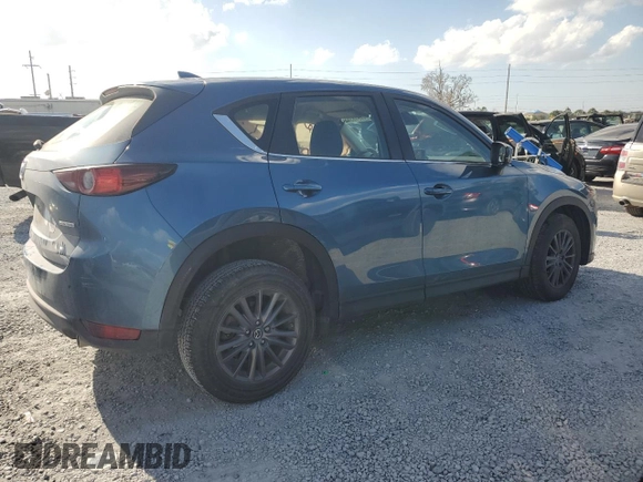 2021 Mazda CX-5 Sport with VIN JM3KFABM1M0414219, listed as a Copart auction lot 44918385 with 40,206 mi miles and Salvage Title. Bid and sale history available at carsss.com. Image 3.