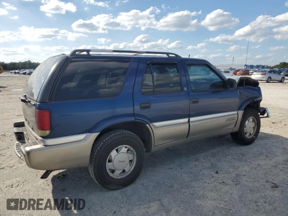 2001 GMC Jimmy SL z VIN 1GKCS13WX12112182, wystawiony jako Copart lot #73460264 z przebiegiem Nie podano mil oraz Nie do naprawy • Non repairable. Historia ofert i sprzedaży dostępna na DreamBid. Obrazek 3.
