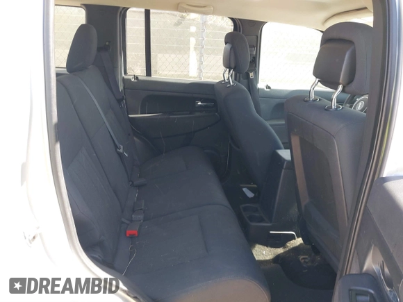 2012 Jeep Liberty Sport with VIN 1C4PJMAK1CW106039, listed as a IAAI auction lot 41810966 with 120,121 mi miles. Bid and sale history available at carsss.com. Image 8.