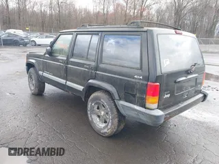 1999 Jeep Cherokee Sport with VIN 1J4FF68SXXL649633, listed as a IAAI auction lot 41992258 with 121,042 mi miles. Bid and sale history available at carsss.com. Image 3.