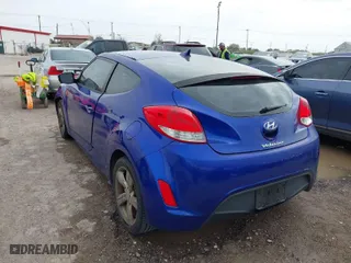 2012 Hyundai Veloster w/Gray Int with VIN KMHTC6ADXCU065990, listed as a IAAI auction lot 41736250 with 126,281 mi miles. Bid and sale history available at carsss.com. Image 3.