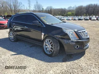 2014 Cadillac SRX Performance Collection z VIN 3GYFNFE33ES645673, wystawiony jako Copart lot #49465915 z przebiegiem 124 233 mil mil oraz Czysty tytuł • Clean title. Historia ofert i sprzedaży dostępna na DreamBid. Obrazek 4.