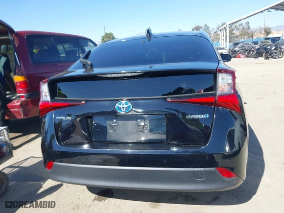 2021 Toyota Prius L Eco with VIN JTDKAMFU3M3148574, listed as a IAAI auction lot 41624303 with 89,747 mi miles. Bid and sale history available at carsss.com. Image 16.
