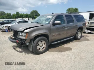 2011 Chevrolet Suburban LT z VIN 1GNSCJE01BR259214, wystawiony jako Copart lot #63521135 z przebiegiem 119 625 mil mil oraz Szkoda całkowita • Salvage title. Historia ofert i sprzedaży dostępna na DreamBid. Obrazek 1.