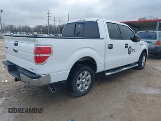 2014 Ford F-150 XL with VIN 1FTFW1CF9EKD01702, listed as a IAAI auction lot 41447899 with 185,247 mi miles. Bid and sale history available at carsss.com. Image 4.