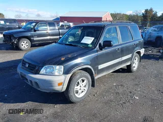 2000 Honda CR-V EX with VIN JHLRD1863YC022811, listed as a IAAI auction lot 41559959 with 211,925 mi miles. Bid and sale history available at carsss.com. Image 2.