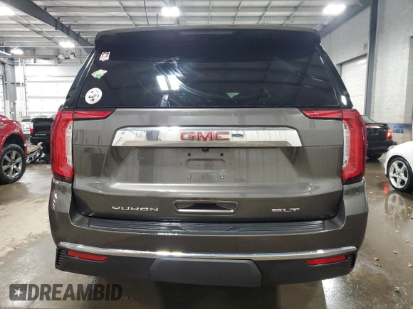 2021 GMC Yukon XL SLT with VIN 1GKS2GKD1MR434218, listed as a Copart auction lot 82777494 with 60,601 mi miles and Salvage Title. Bid and sale history available at carsss.com. Image 6.