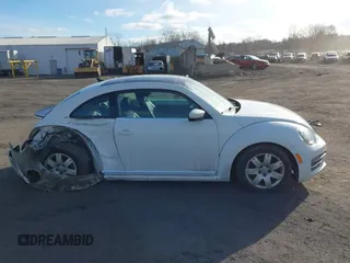 2019 Volkswagen Beetle SE with VIN 3VWJD7AT6KM713525, listed as a IAAI auction lot 41508195 with 73,360 mi miles. Bid and sale history available at carsss.com. Image 13.