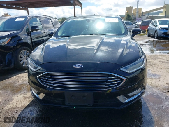 2017 Ford Fusion Titanium with VIN 3FA6P0SU0HR277268, listed as a IAAI auction lot 41798990 with 140,452 mi miles and . Bid and sale history available at DreamBid. Image 13.