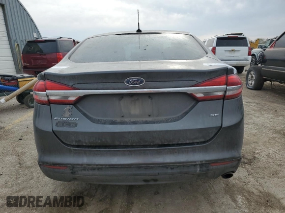 2017 Ford Fusion SE z VIN 3FA6P0H76HR137923, wystawiony jako Copart lot #51309045 z przebiegiem 171 056 mil mil oraz Szkoda całkowita • Salvage title. Historia ofert i sprzedaży dostępna na DreamBid. Obrazek 6.