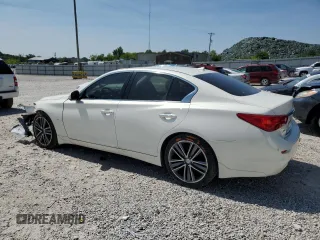 2015 Infiniti Q50 Premium with VIN JN1BV7AR9FM392349, listed as a Copart auction lot 59121255 with 104,199 mi miles and Salvage title. Bid and sale history available at DreamBid. Image 2.