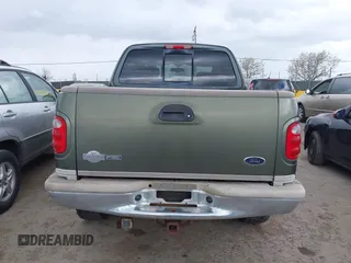 2003 Ford F-150 XLT with VIN 1FTRW08L43KC83824, listed as a IAAI auction lot 41885702 with 242,195 mi miles. Bid and sale history available at carsss.com. Image 16.