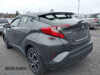 2019 Toyota C-HR XLE with VIN JTNKHMBX5K1035676, listed as a IAAI auction lot 41161562 with 185,962 mi miles. Bid and sale history available at carsss.com. Image 3.