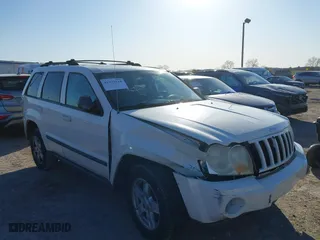 2007 Jeep Grand Cherokee Laredo with VIN 1J8GR48K37C525797, listed as a IAAI auction lot 41929118 with 244,092 mi miles. Bid and sale history available at carsss.com. Image 6.