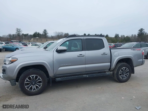 2020 Toyota Tacoma 4WD SR5 with VIN 3TMCZ5AN6LM306311, listed as a IAAI auction lot 41220025 with 67,806 mi miles. Bid and sale history available at carsss.com. Image 15.