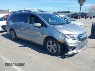 2020 Honda Odyssey EX-L z VIN 5FNRL6H79LB048976, wystawiony jako IAAI lot #42270093 z przebiegiem 85 773 mil mil oraz . Historia ofert i sprzedaży dostępna na DreamBid. Obrazek 1.