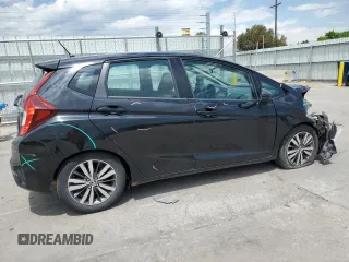 2015 Honda Fit EX-L z VIN 3HGGK5H80FM704920, wystawiony jako Copart lot #59834245 z przebiegiem 86 415 mil mil oraz Szkoda całkowita • Salvage title. Historia ofert i sprzedaży dostępna na DreamBid. Obrazek 3.