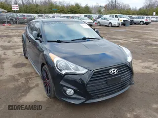 2013 Hyundai Veloster Turbo w/Black Int with VIN KMHTC6AE5DU151346, listed as a IAAI auction lot 41177509 with 112,955 mi miles. Bid and sale history available at carsss.com. Image 1.