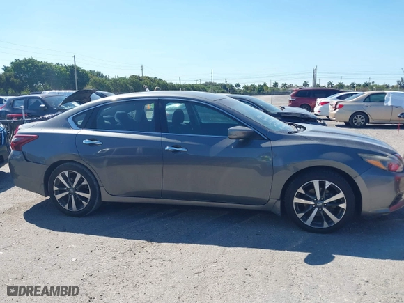 2017 Nissan Altima 2.5 SR with VIN 1N4AL3APXHC142963, listed as a IAAI auction lot 41849533 with 51,237 mi miles. Bid and sale history available at carsss.com. Image 13.