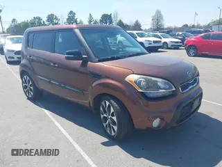 2012 Kia Soul + with VIN KNDJT2A62C7433969, listed as a IAAI auction lot 41921060 with 142,964 mi miles. Bid and sale history available at carsss.com. Image 1.