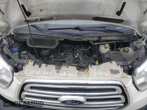 2019 Ford Transit with VIN 1FTBW3XG1KKB82665, listed as a Copart auction lot 57649055 with 440,416 mi miles and Salvage title. Bid and sale history available at DreamBid. Image 12.