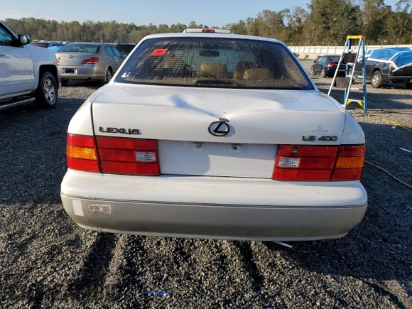 2000 Lexus LS 400 z VIN JT8BH28F0Y0175297, wystawiony jako Copart lot #75230834 z przebiegiem 293 851 mil mil oraz Szkoda całkowita • Salvage title. Historia ofert i sprzedaży dostępna na DreamBid. Obrazek 6.