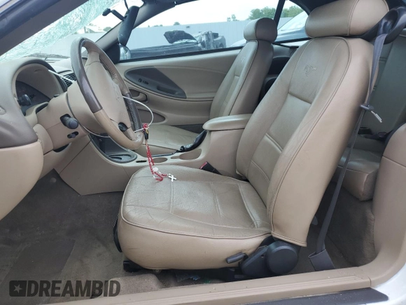 2004 Ford Mustang Deluxe with VIN 1FAFP446X4F238670, listed as a Copart auction lot 60922635 with 121,880 mi miles and Salvage title. Bid and sale history available at DreamBid. Image 7.