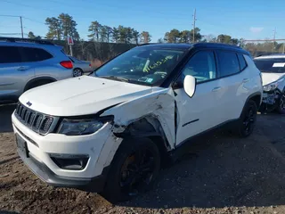 2020 Jeep Compass Latitude with VIN 3C4NJDBB9LT139639, listed as a IAAI auction lot 41695315 with 64,927 mi miles and . Bid and sale history available at DreamBid. Image 6.