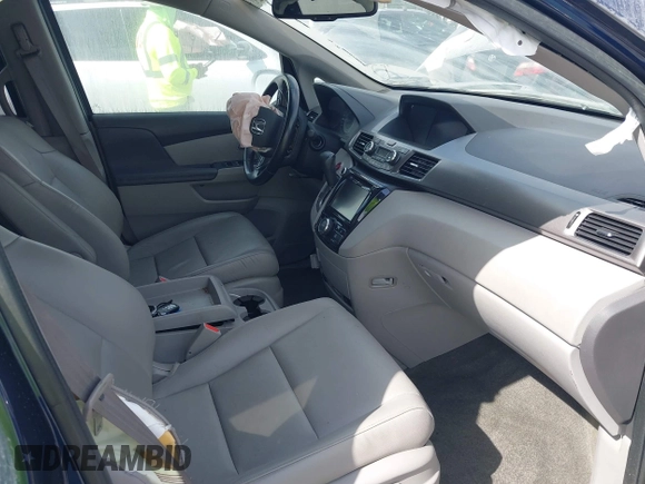 2015 Honda Odyssey EX-L z VIN 5FNRL5H65FB090177, wystawiony jako IAAI lot #41575419 z przebiegiem 128 582 mil mil oraz . Historia ofert i sprzedaży dostępna na DreamBid. Obrazek 5.