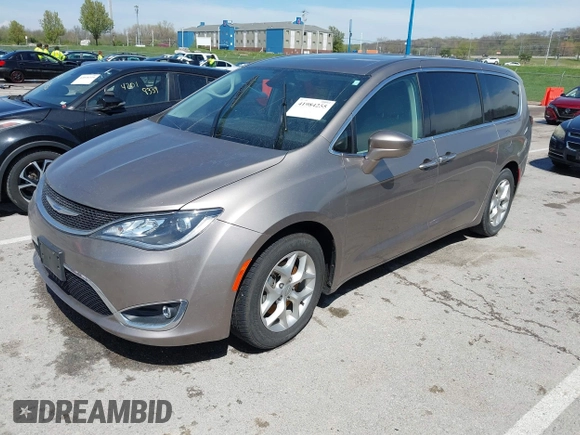 2018 Chrysler Pacifica Touring Plus with VIN 2C4RC1FG4JR306554, listed as a IAAI auction lot 41984255 with 107,109 mi miles and . Bid and sale history available at DreamBid. Image 2.