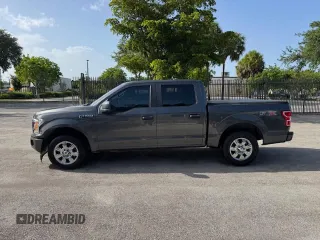 2019 Ford F-150 XL with VIN 1FTEW1CP1KKF22890, listed as a Copart auction lot 61813095 with 63,774 mi miles and Salvage title. Bid and sale history available at DreamBid. Image 12.