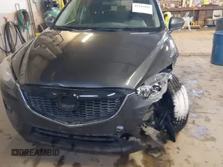 2015 Mazda CX-5 Touring with VIN JM3KE2CY2F0458114, listed as a IAAI auction lot 41545493 with 138,061 mi miles. Bid and sale history available at carsss.com. Image 6.