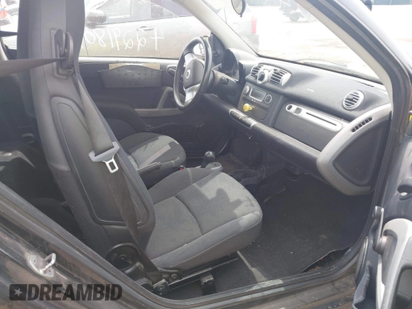 2013 Smart fortwo Pure with VIN WMEEJ3BA5DK663165, listed as a IAAI auction lot 42291804 with 105,074 mi miles and . Bid and sale history available at DreamBid. Image 5.