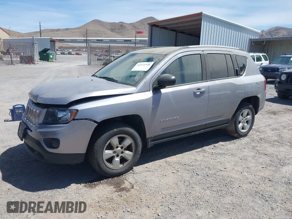 2016 Jeep Compass Sport with VIN 1C4NJCBB2GD577084, listed as a IAAI auction lot 42572348 with 164,234 mi miles and . Bid and sale history available at DreamBid. Image 2.