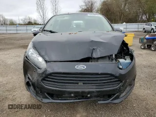 2019 Ford Fiesta SE z VIN 3FADP4EJ8KM124903, wystawiony jako Copart lot #54560125 z przebiegiem 86 616 mil mil oraz Szkoda całkowita • Salvage title. Historia ofert i sprzedaży dostępna na DreamBid. Obrazek 5.