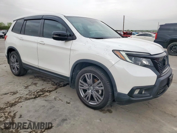 2020 Honda Passport EX-L with VIN 5FNYF7H57LB002957, listed as a Copart auction lot 51022825 with 74,868 mi miles and Salvage Title. Bid and sale history available at DreamBid. Image 4.