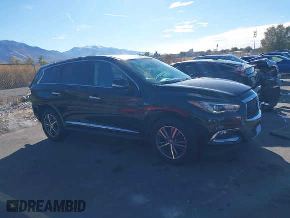 2020 Infiniti QX60 Luxe with VIN 5N1DL0MM5LC522210, listed as a IAAI auction lot 40913550 with 90,289 mi miles and . Bid and sale history available at DreamBid. Image 13.