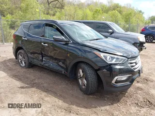 2018 Hyundai Santa Fe 2.4L z VIN 5NMZUDLB2JH058032, wystawiony jako IAAI lot #42206116 z przebiegiem 138 688 mil mil oraz . Historia ofert i sprzedaży dostępna na DreamBid. Obrazek 1.