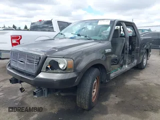 2005 Ford F-150 XLT with VIN 1FTPW12575KB99409, listed as a IAAI auction lot 41711304 with 1 mi miles. Bid and sale history available at carsss.com. Image 21.