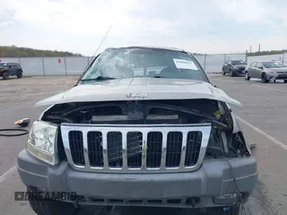 2000 Jeep Grand Cherokee Laredo with VIN 1J4GW48N5YC322707, listed as a IAAI auction lot 42080677 with Not provided miles and . Bid and sale history available at DreamBid. Image 6.