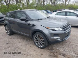 2015 Land Rover Range Rover Evoque Pure Plus z VIN SALVP2BG7FH047942, wystawiony jako IAAI lot #42047058 z przebiegiem 166 512 mil mil oraz . Historia ofert i sprzedaży dostępna na DreamBid. Obrazek 1.