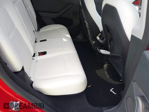 2023 Tesla Model Y Long Range with VIN 7SAYGDEE1PA154996, listed as a IAAI auction lot 41472595 with 24,861 mi miles and . Bid and sale history available at DreamBid. Image 8.