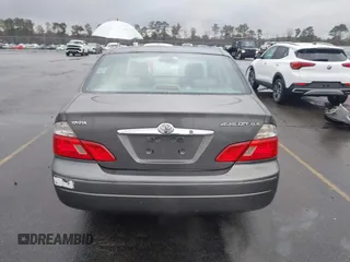 2003 Toyota Avalon XL with VIN 4T1BF28B93U337672, listed as a IAAI auction lot 41626441 with 240,787 mi miles and . Bid and sale history available at carsss.com. Image 16.