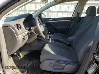 2009 Volkswagen Rabbit S with VIN WVWDA71K59W147903, listed as a Copart auction lot 76706654 with 73,297 mi miles and Salvage title. Bid and sale history available at DreamBid. Image 7.
