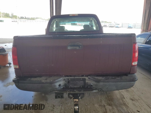 2004 Ford F-250 XL with VIN 1FTNX20L34EA06312, listed as a Copart auction lot 53779295 with 315,600 mi miles and Salvage title. Bid and sale history available at DreamBid. Image 6.