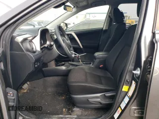 2018 Toyota RAV4 LE with VIN JTMBFREV8JJ260321, listed as a Copart auction lot 50588215 with 208,236 mi miles and Salvage title. Bid and sale history available at DreamBid. Image 7.